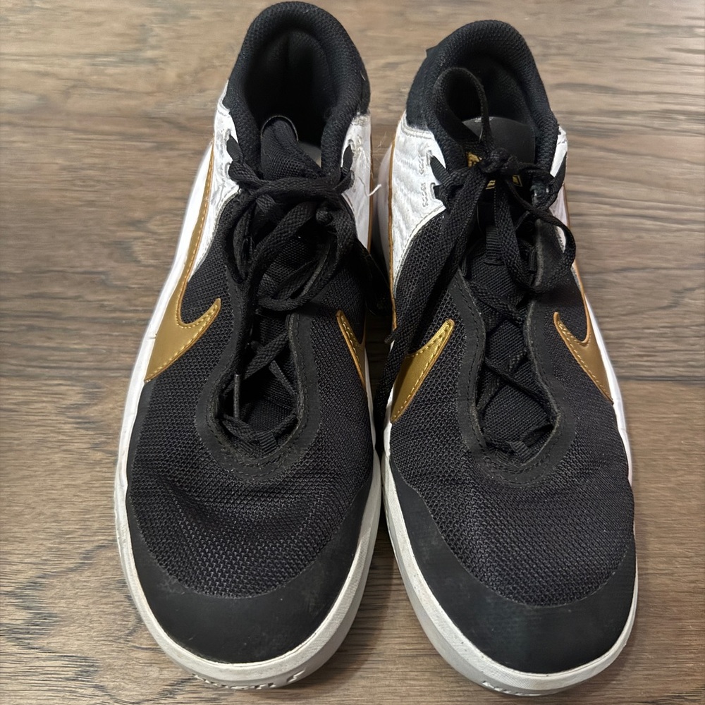 Nike Hustle DX Men's Black and Gold Athletic Shoes